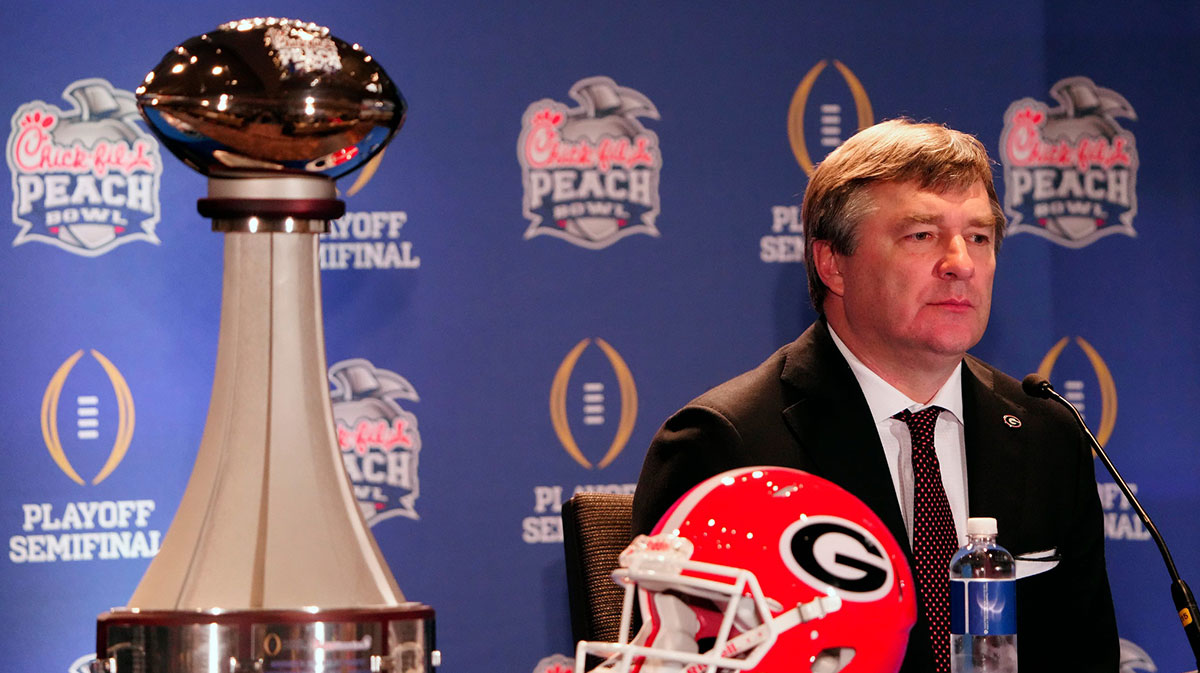 Georgia Bulldogs head coach Kirby Smart listens to a question from the media during the coaches Peach Bowl press conference at the Westin Peachtree Plaza. Ceb Peachbowl Coaches Kwr 05