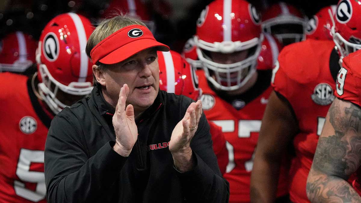 Georgia coach Kirby Smart takes the field with his team before the start of the SEC championship game against Texas in Atlanta, on Saturday, Dec. 7, 2024.