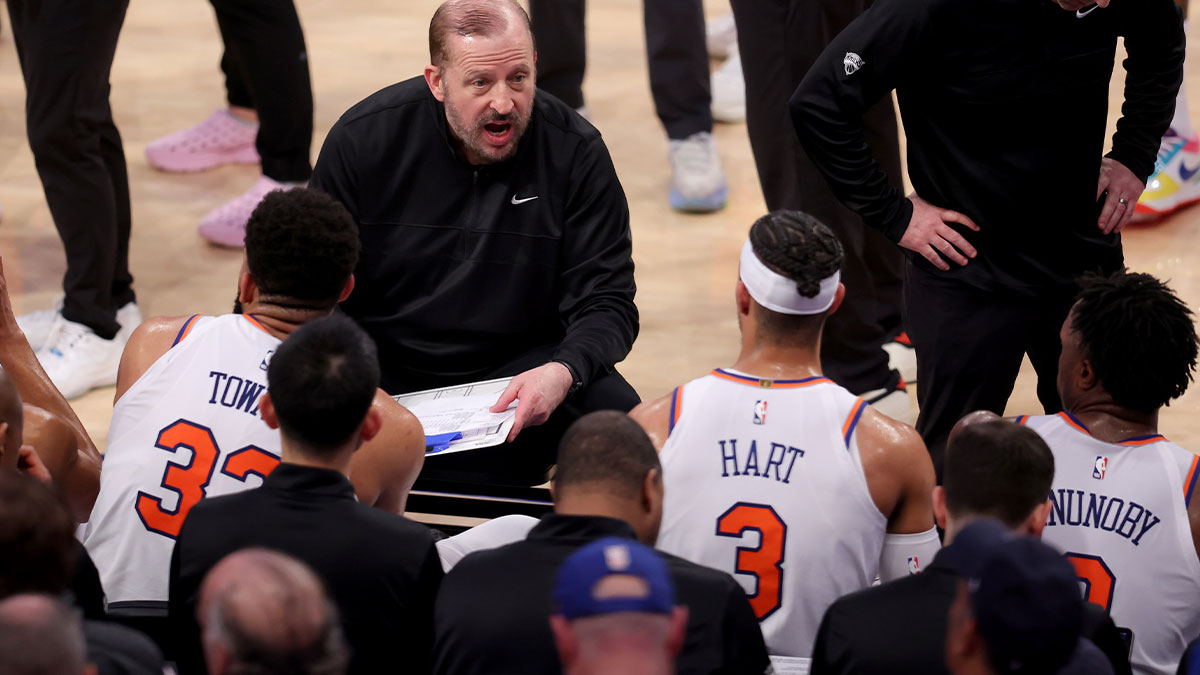 New York Knicks head coach Tom Thibodeau talks to center Karl-Anthony Towns (32) and guard Josh Hart (3) and forward OG Anunoby (8) during a time out during the third quarter of game six in the second round of the 2025 NBA Playoffs against the Boston Celtics at Madison Square Garden.