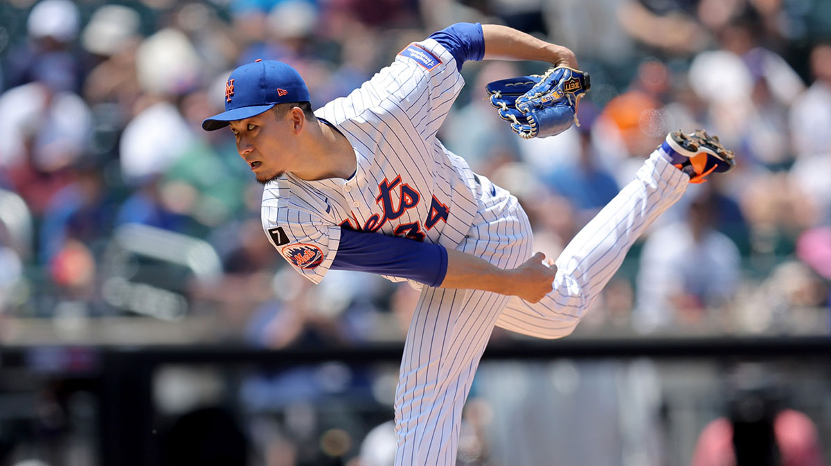 Jun 12, 2025; New York City, New York, USA; New York Mets starting pitcher Kodai Senga (34) follows through on a pitch against the Washington Nationals during the first inning at Citi Field.