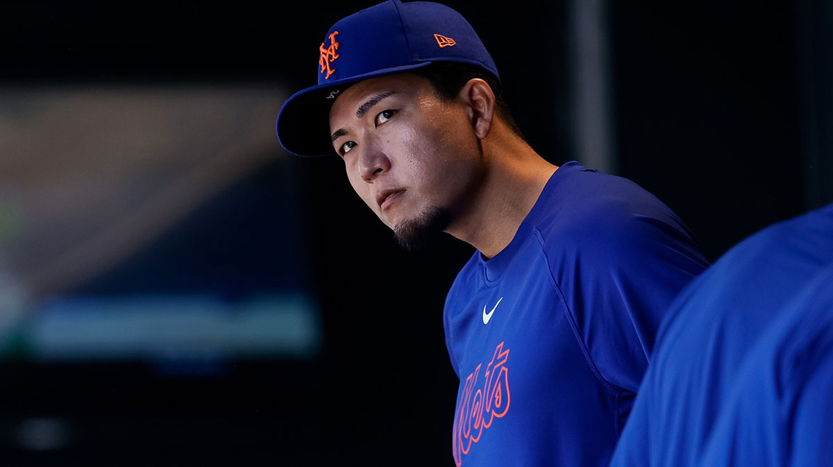 Jun 8, 2025; Denver, Colorado, USA; New York Mets pitcher Kodai Senga (34) looks on in the dugout in the second inning against the Colorado Rockies at Coors Field. Mandatory Credit: Isaiah J. Downing-Imagn Images