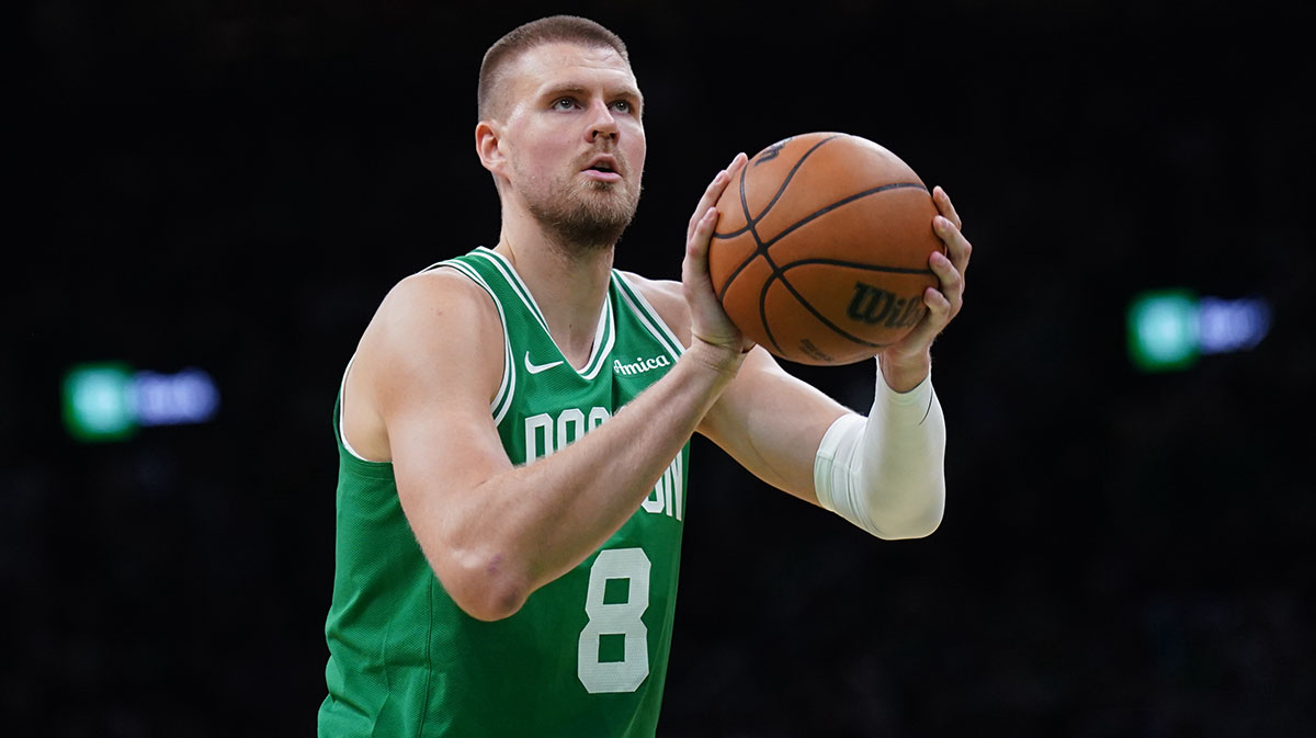 Boston Celtics center Kristaps Porzingis (8) shoots a free throw against the New York Knicks in the second half during game two of the second round for the 2025 NBA Playoffs at TD Garden.