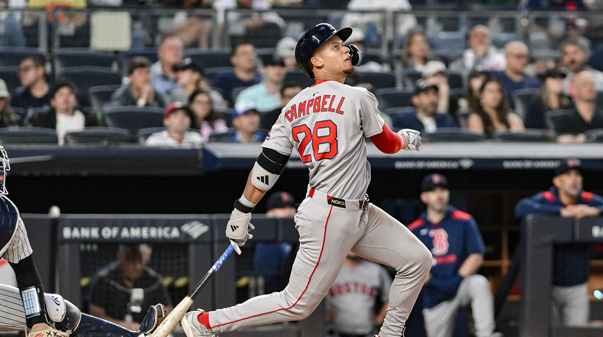 Jun 8, 2025; Bronx, New York, USA; Boston Red Sox second baseman Kristian Campbell (28) hits a two-run home run against the New York Yankees during the fifth inning at Yankee Stadium.