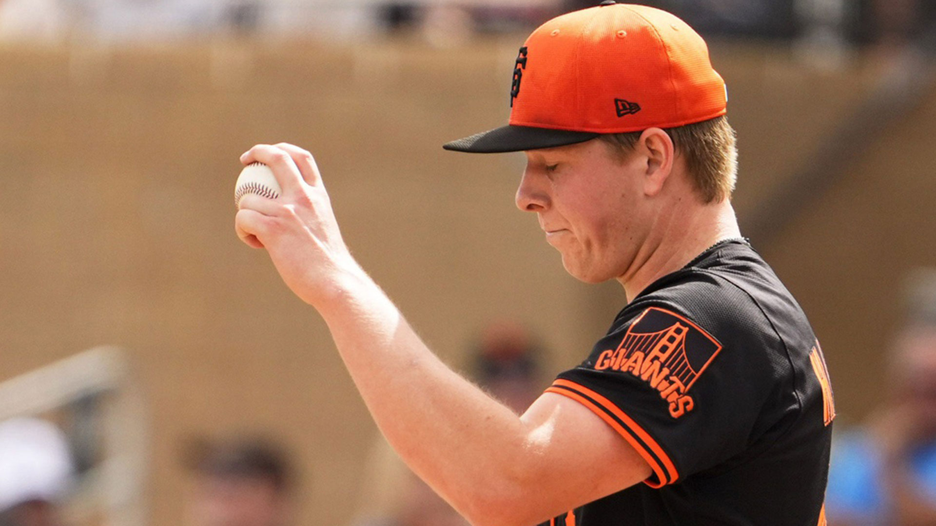 San Francisco Giants pitcher Kyle Harrison reacts after allowing an RBI single to Arizona Diamondbacks outfielder Lourdes Gurriel Jr. in the first inning during a spring training game.