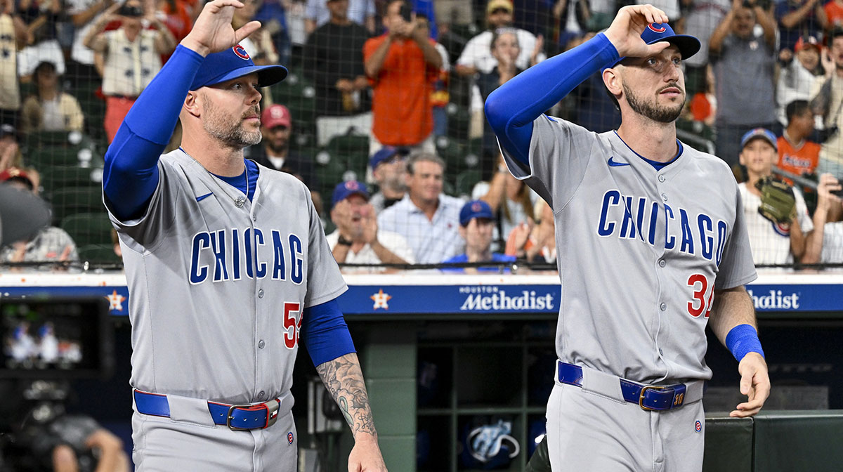 Chicago Cubs pitcher Ryan Pressly (55) and outfielder Kyle Tucker (30) receive a standing ovation from the crows during their return to Daikin Park prior to the game against the Houston Astros at Daikin Park