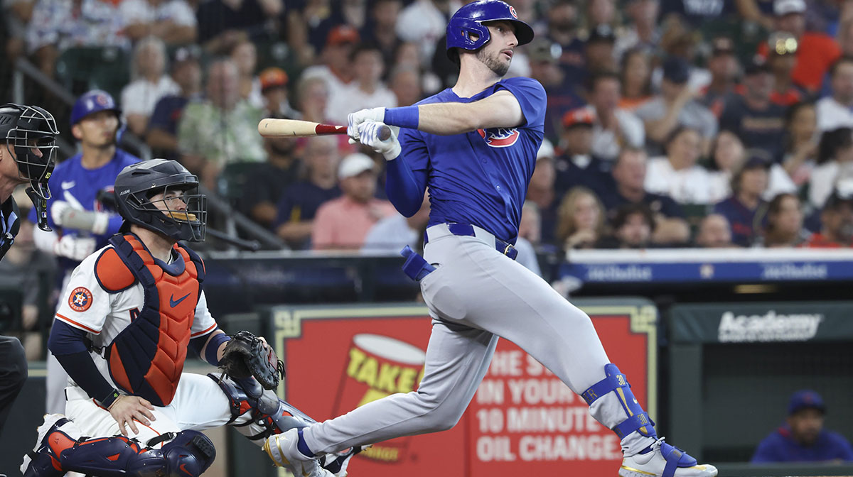 Chicago Cubs right fielder Kyle Tucker (30) hits a single during the first inning against the Houston Astros at Daikin Park.