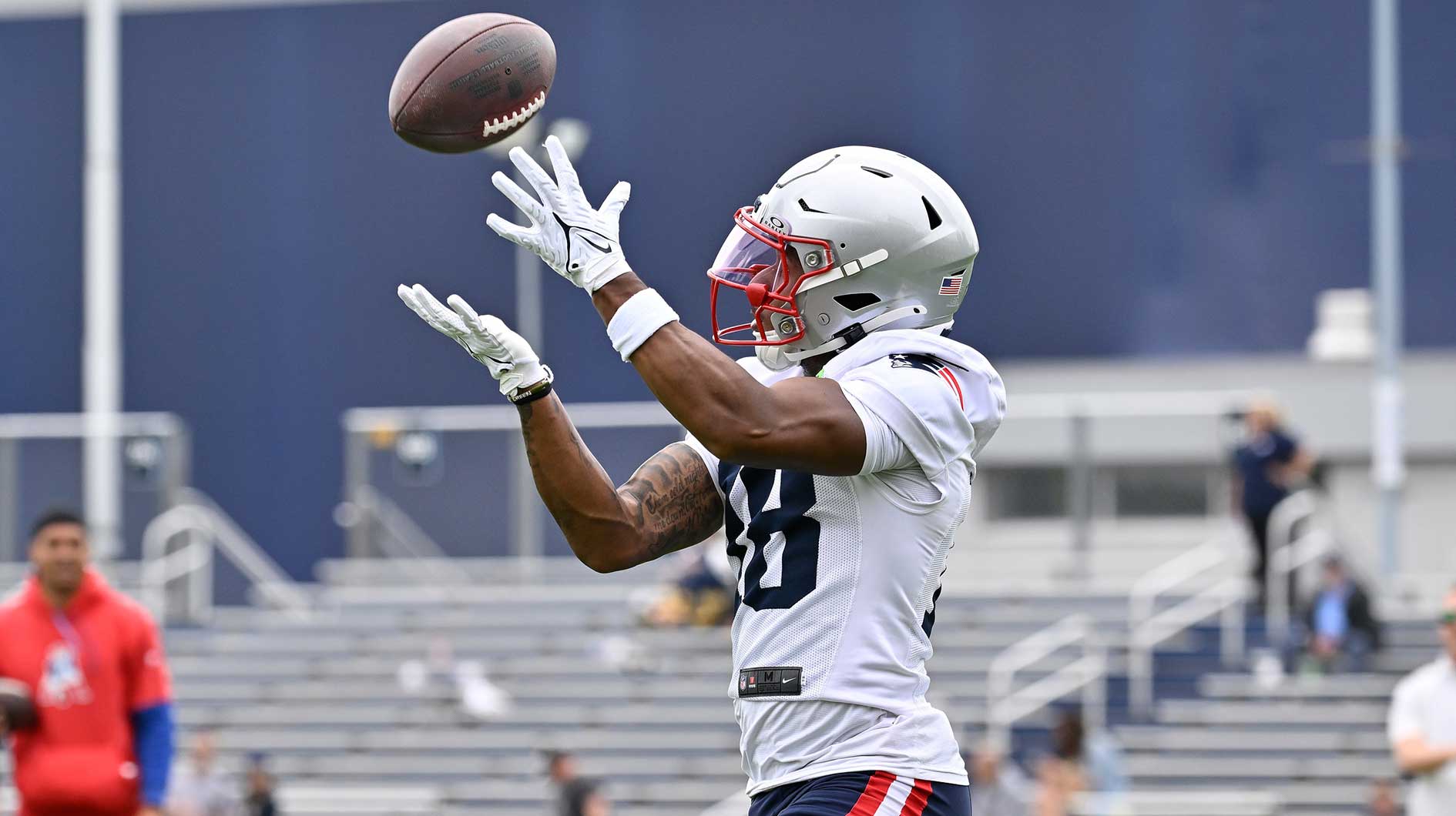 New England Patriots wide receiver Kyle Williams (18) makes a catch during minicamp at Gillette Stadium.