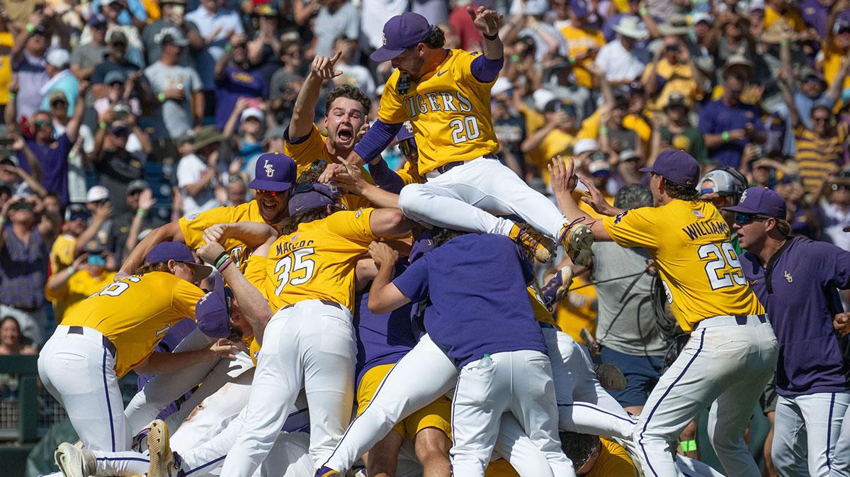 The LSU Tigers celebrate after defeating the Coastal Carolina Chanticleers to win the College World Series at Charles Schwab Field