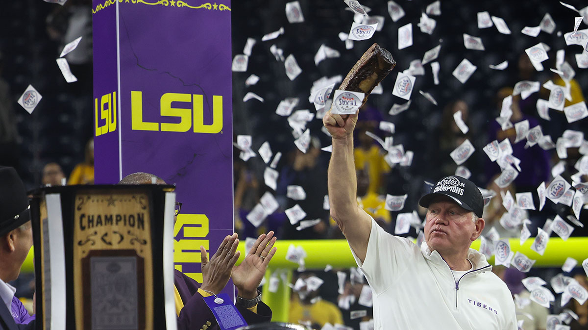 LSU Tigers head coach Brian Kelly celebrates after defeating the Baylor Bears in the Kinder’s Texas Bowl in the second half at NRG Stadium.