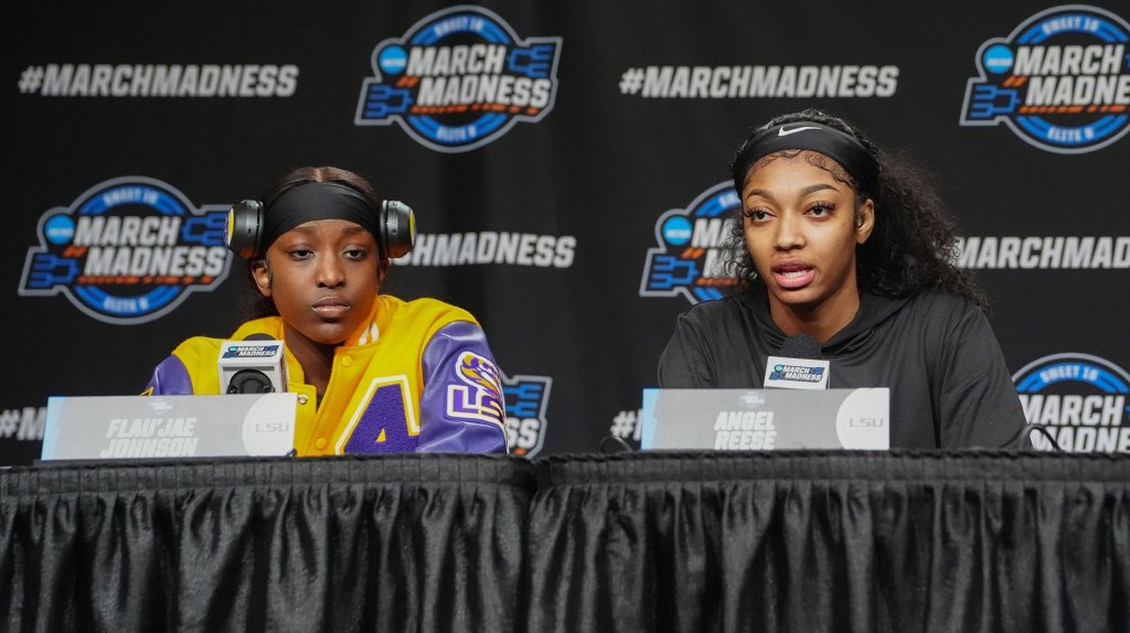 LSU Tigers guard Flau'jae Johnson (4) and forward Angel Reese (10) answer questions during the press conference to their NCAA Tournament Sweet 16 game.