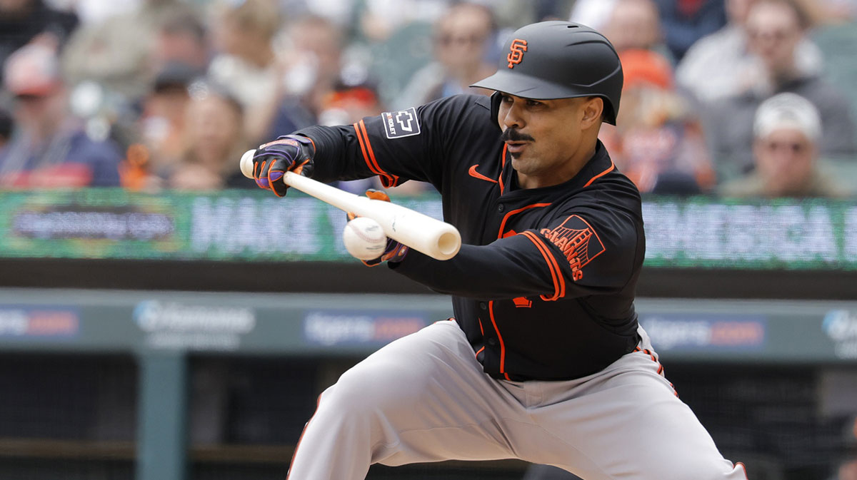San Francisco Giants first base LaMonte Wade Jr. (31) bunts in the fourth inning against the Detroit Tigers at Comerica Park.