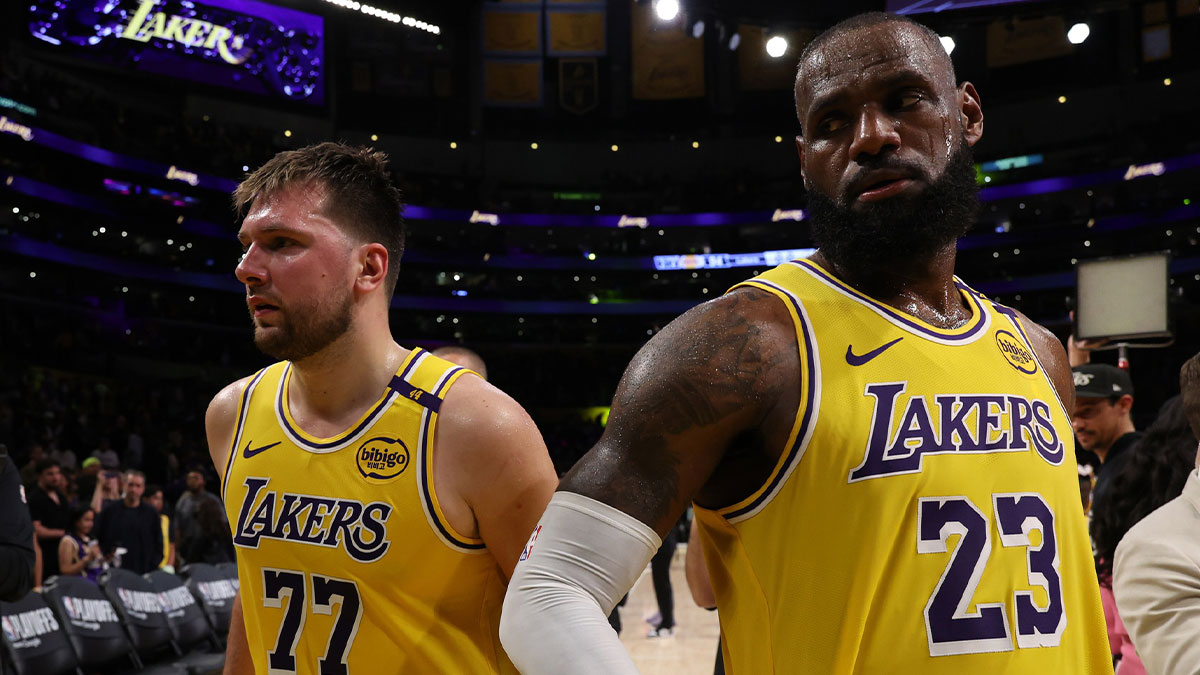 Lakers guard Luka Doncic (77) and Los Angeles Lakers forward LeBron James (23) leave a court after defeating the Minnesota Timberwolves 94-85 in game two of first round for the 2024 NBA Playoffs at Crypto.com Arena