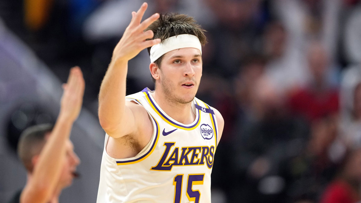 Los Angeles Lakers guard Austin Reaves (15) gestures after making a three point basket against the Golden State Warriors during the fourth quarter at Chase Center