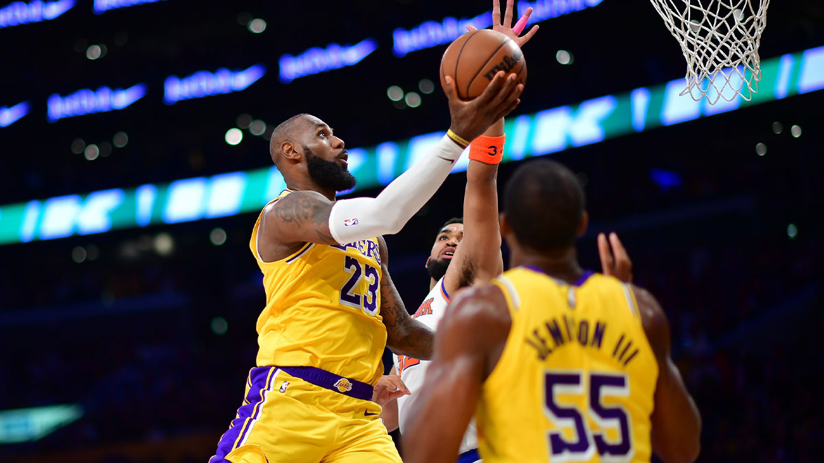 Los Angeles Lakers forward LeBron James (23) moves to the basket against New York Knicks center Karl-Anthony Towns (32) during the second half at Crypto.com Arena.