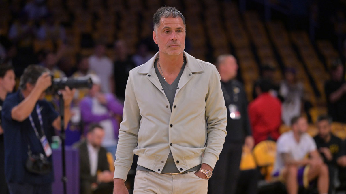 Los Angeles Lakers general manager Rob Pelinka walks on the couet prior to the game against the Minnesota Timberwolves at Crypto.com Arena.