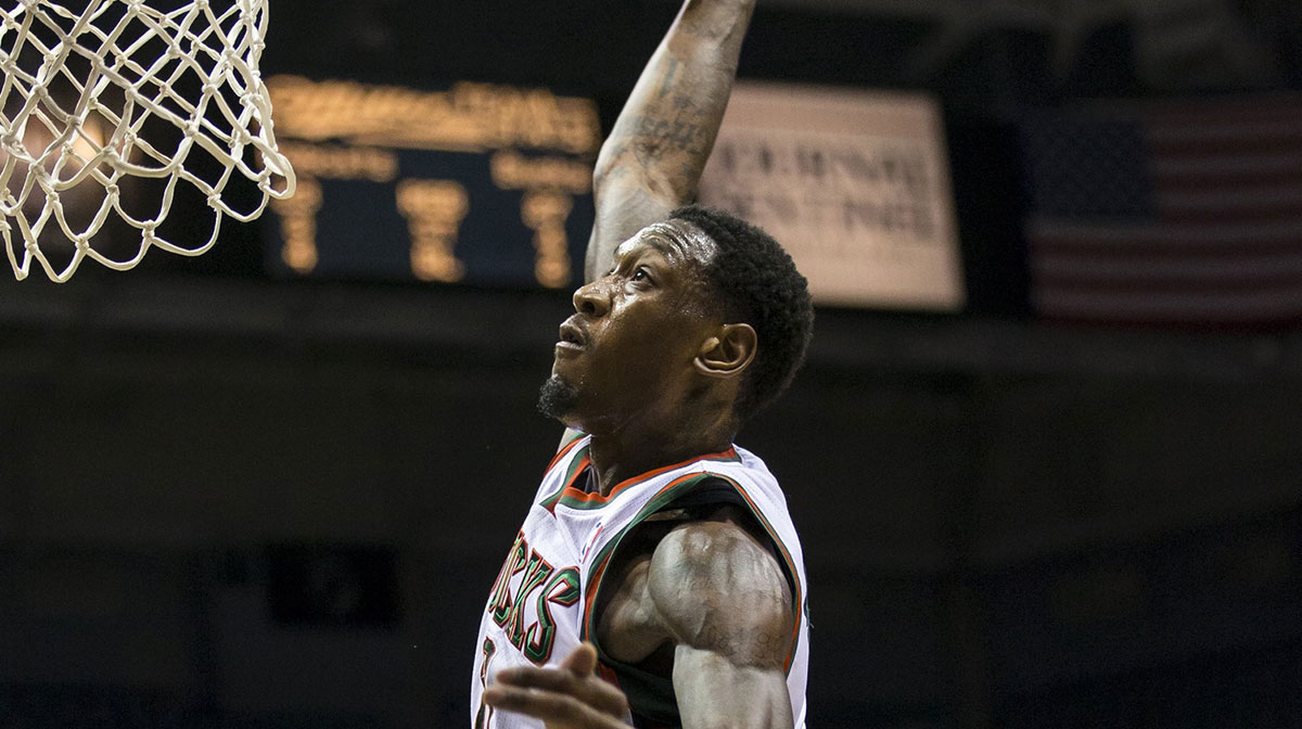 Milwaukee Bucks center Larry Sanders (8) dunks during the third quarter against the Charlotte Bobcats at the BMO Harris Bradley Center.