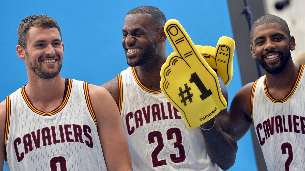 Cleveland Cavaliers forward Kevin Love (0), forward LeBron James (23) and guard Kyrie Irving (2) laugh during a photo session during media day at Cleveland Clinic Courts.