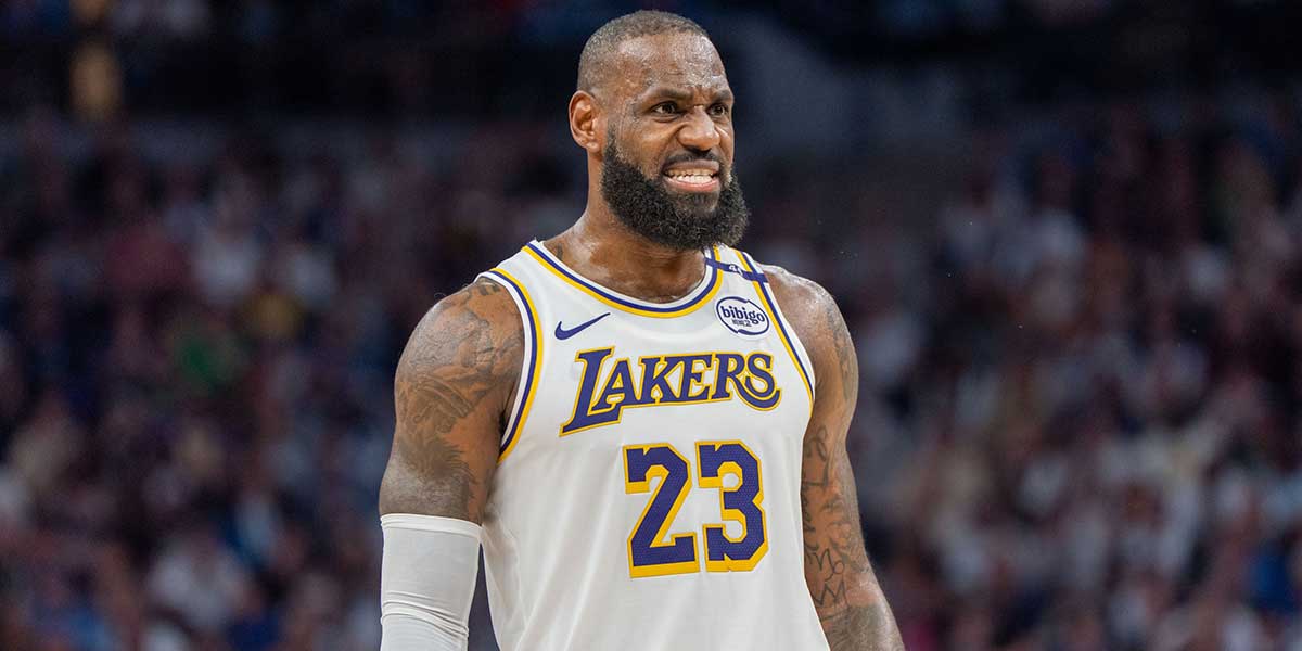 Los Angeles Lakers forward LeBron James (23) talks with a referee in the third quarter against the Minnesota Timberwolves during game four of first round for the 2025 NBA Playoffs at Target Center.