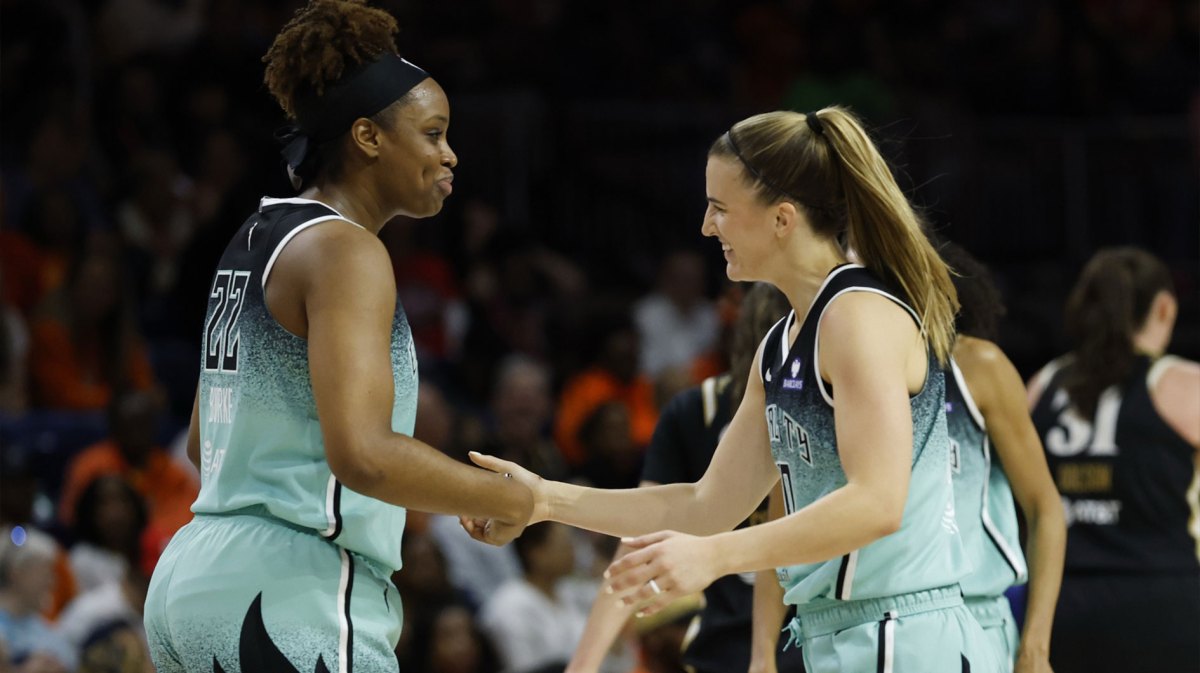 New York Liberty forward Kennedy Burke (22) celebrates with Liberty guard Sabrina Ionescu (20) against the Washington Mystics in the second half at Entertainment & Sports Arena.