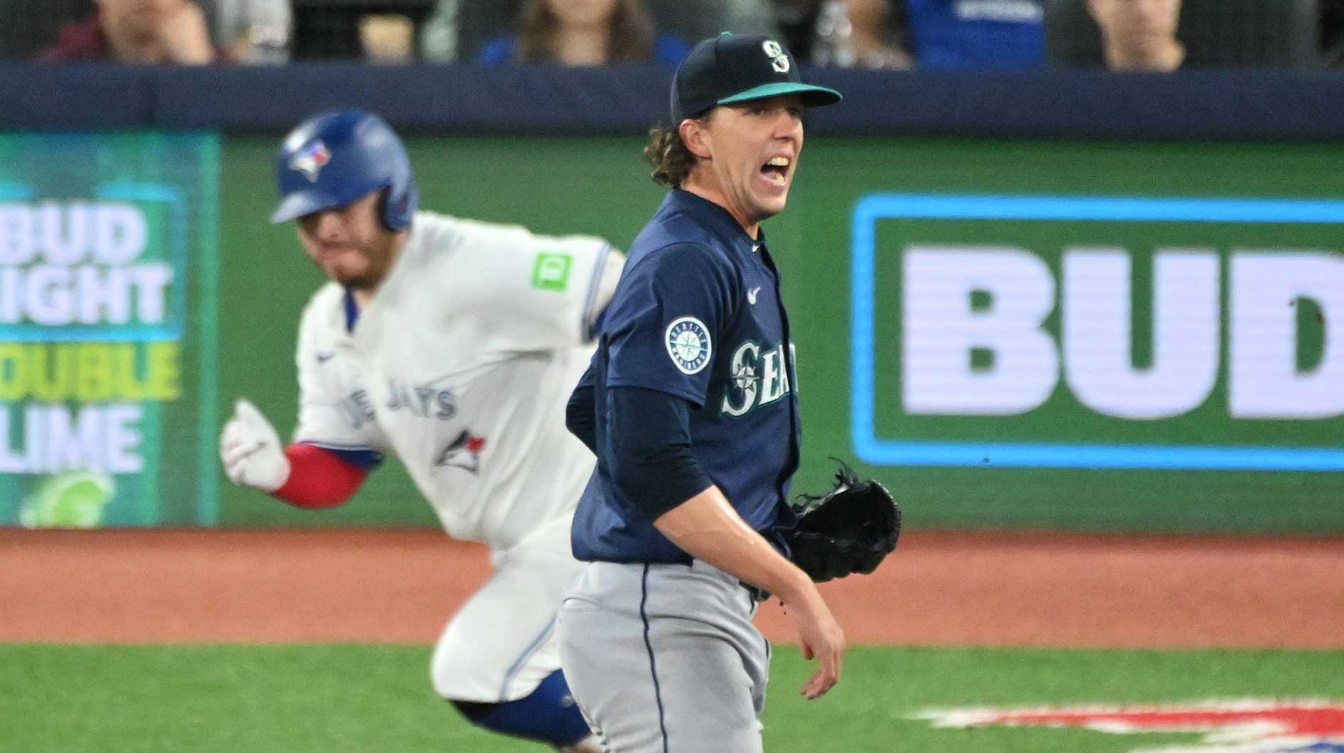 Seattle Mariners pitcher Logan Gilbert (36) reacts after giving up an RBI single to Toronto Blue Jays catcher Alejandro Kirk (30) in the fifth inning at Rogers Centre.