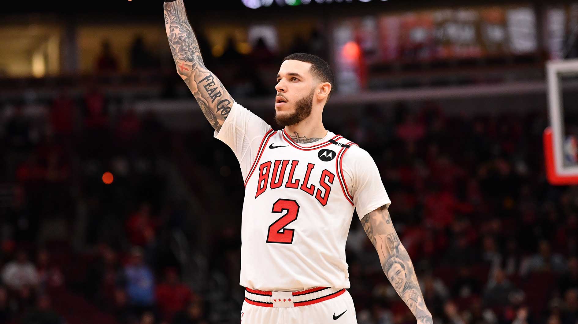 Chicago Bulls forward Lonzo Ball (2) hits a three point shot against Toronto Raptors guard Jamal Shead (23) during overtime at the United Center.