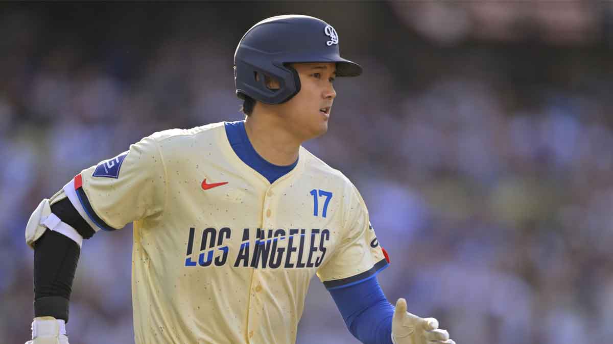 Los Angeles Dodgers designated hitter Shohei Ohtani (17) singles in the fifth inning at Dodger Stadium.