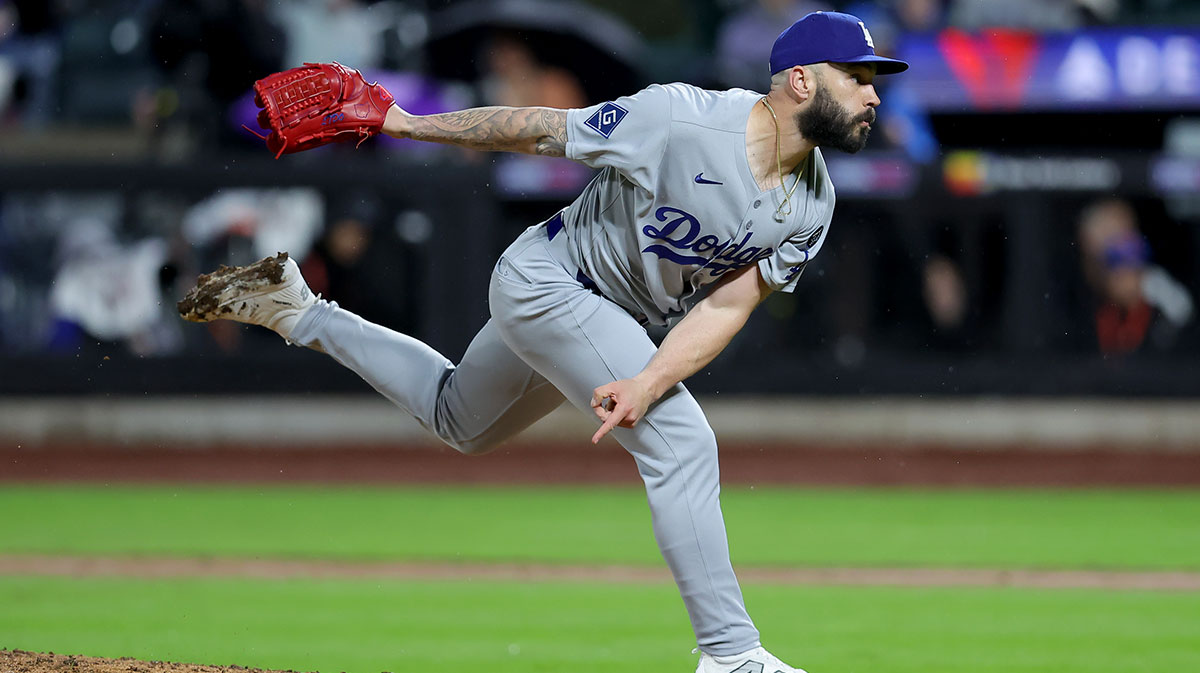Los Angeles Dodgers relief pitcher Tanner Scott (66) pitches against the New York Mets during the ninth inning at Citi Field.