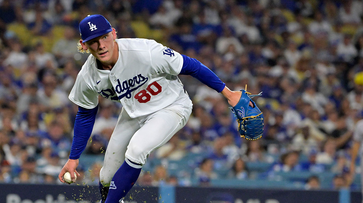 Los Angeles Dodgers starting pitcher Emmet Sheehan (80) makes a throw to first base against the Arizona Diamondbacks during the third inning for game one of the NLDS for the 2023 MLB playoffs at Dodger Stadium.