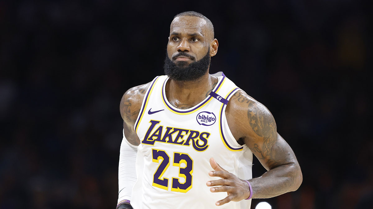 Los Angeles Lakers forward LeBron James (23) reacts after scoring against the Oklahoma City Thunder during the second half at Paycom Center.