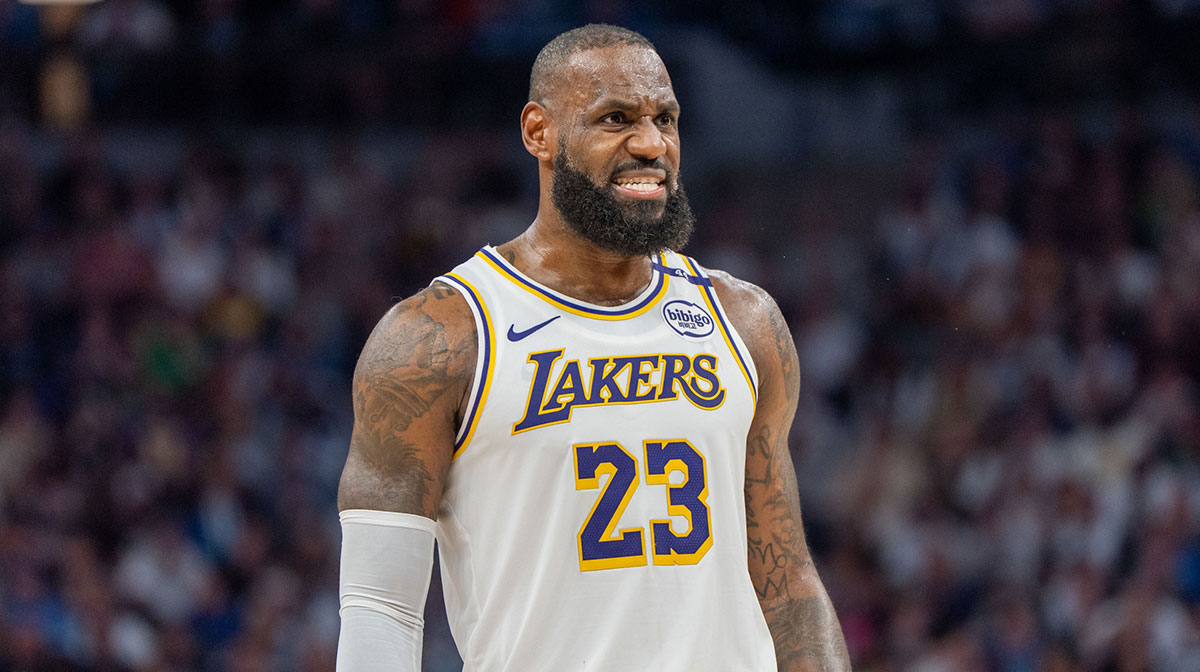 Los Angeles Lakers forward LeBron James (23) talks with a referee in the third quarter against the Minnesota Timberwolves during game four of first round for the 2025 NBA Playoffs at Target Center.