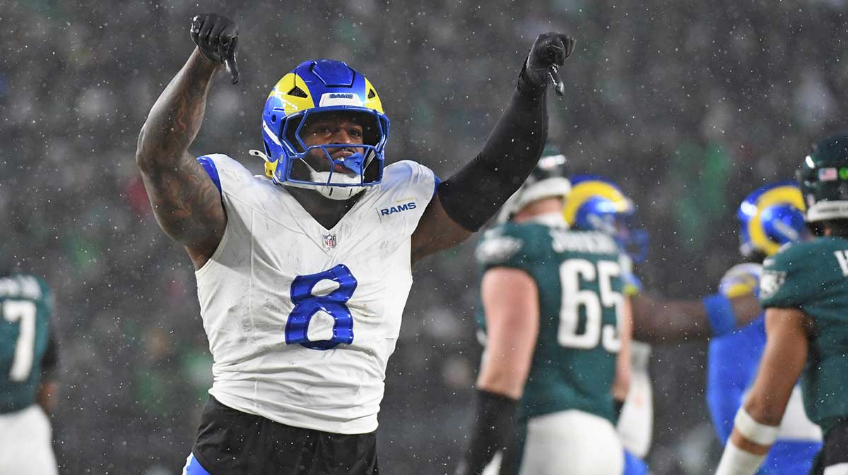 Los Angeles Rams linebacker Jared Verse (8) reacts after a play against the Philadelphia Eagles in a 2025 NFC divisional round game at Lincoln Financial Field.