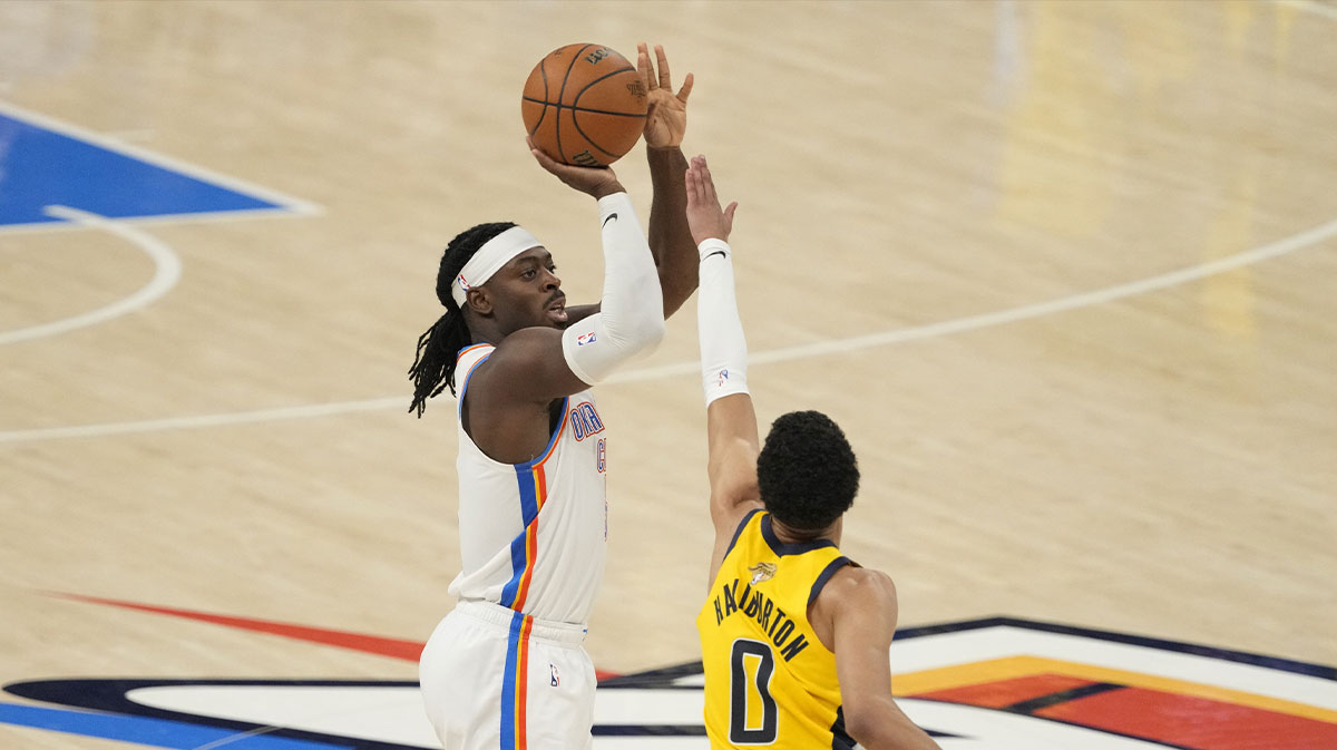 Oklahoma City Thunder guard Luguentz Dort (5) shoots against Indiana Pacers guard Tyrese Haliburton (0) during the third quarter of game five of the 2025 NBA Finals at Paycom Center.