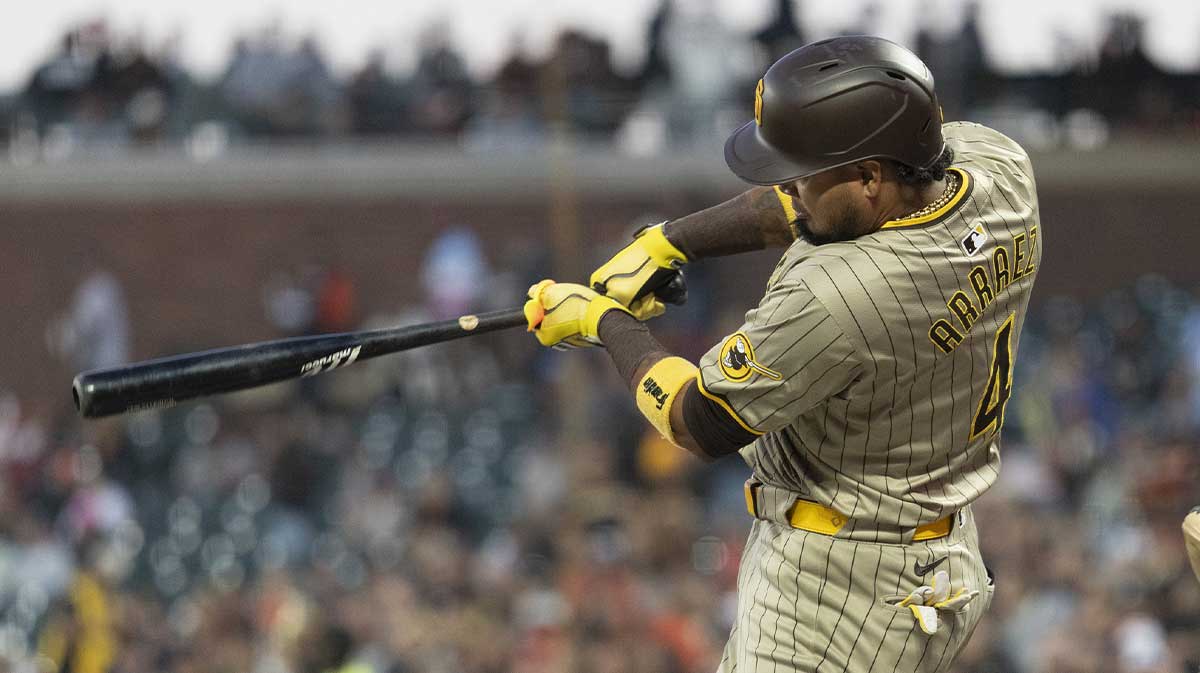 Sep 13, 2024; San Francisco, California, USA; San Diego Padres first base Luis Arraez (4) hits a single during the first inning against the San Francisco Giants at Oracle Park. Mandatory Credit: Stan Szeto-Imagn Images
