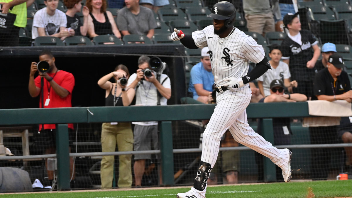 Chicago White Sox center fielder Luis Robert Jr. (88) rounds the bases and celebrates his home run during the second inning against the Arizona Diamondbacks at Rate Field.