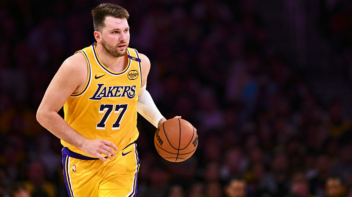 Los Angeles Lakers guard Luka Doncic (77) moves the ball against the Houston Rockets during the first half at Crypto.com Arena.