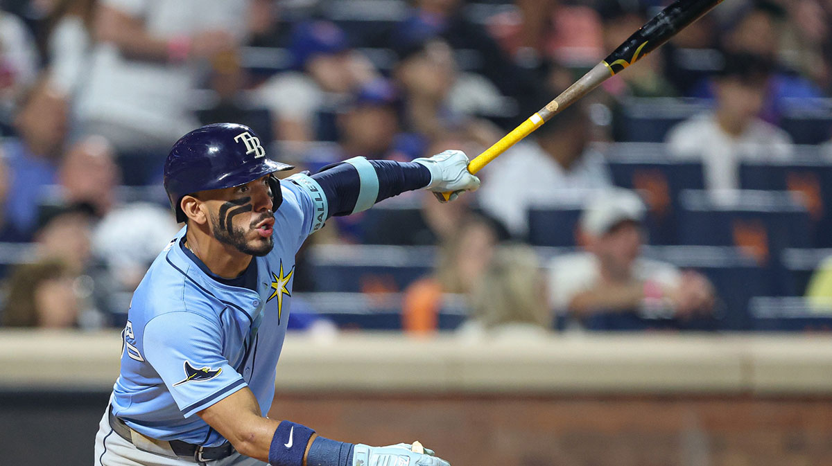 Tampa Bay Rays shortstop Jose Caballero (77) singles during the eighth inning against the New York Mets at Citi Field.
