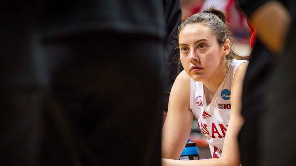 Indiana's Mackenzie Holmes (54) listens during a timeout during second round NCAA action.