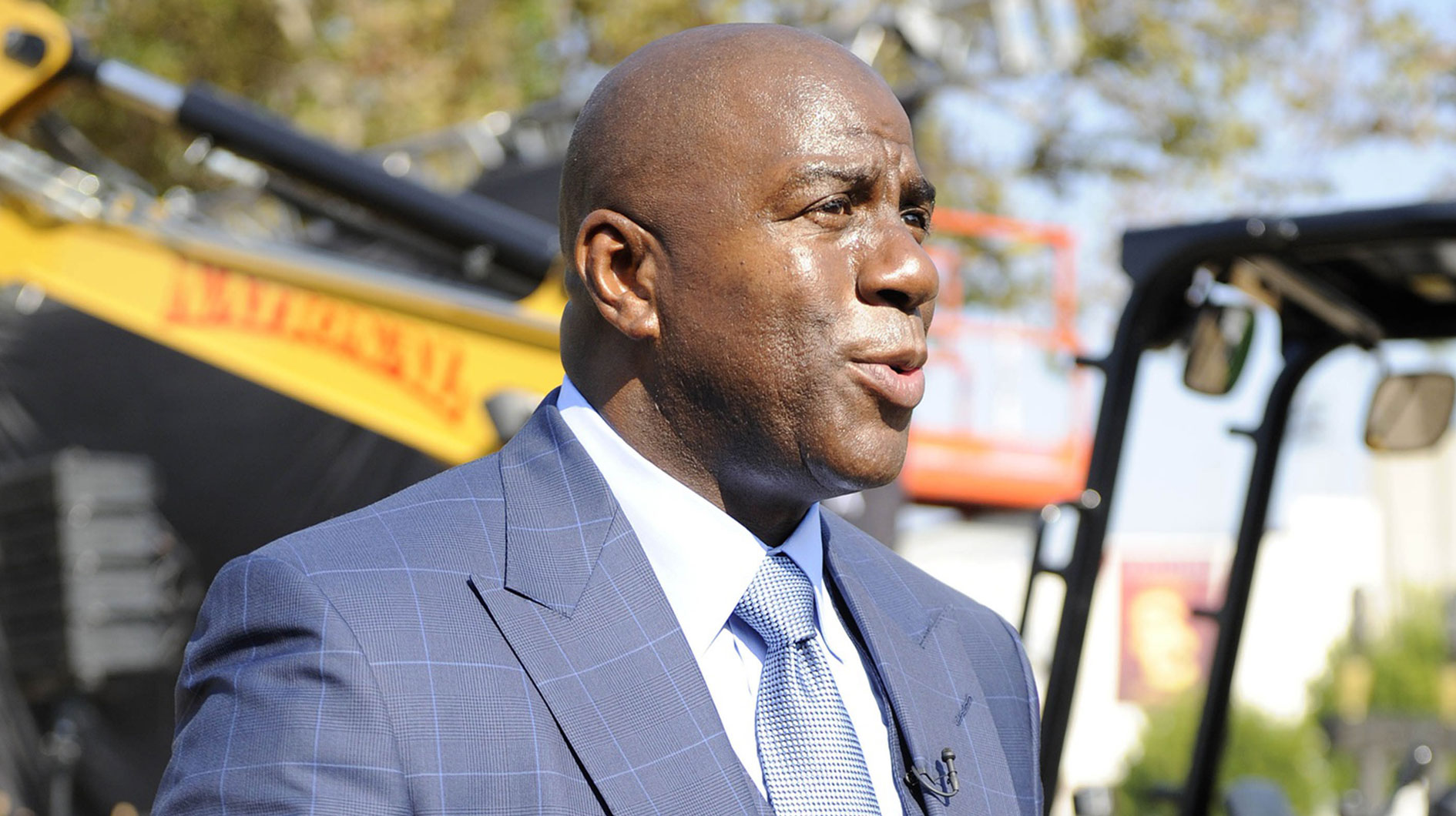 LAFC investor Magic Johnson speaks with media before groundbreaking ceremonies at Los Angeles Football Club Stadium Site.