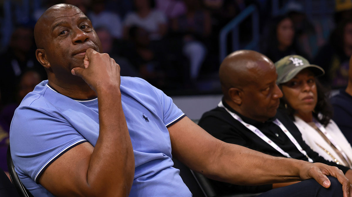 Magic Johnson attends a WNBA game between the Los Angeles Sparks and the Minnesota Lynx at Crypto.com Arena.