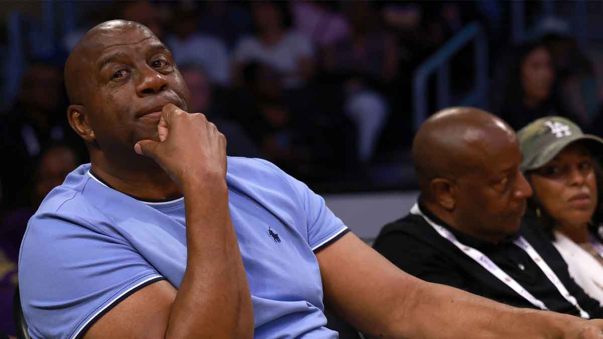 Magic Johnson attends a WNBA game between the Los Angeles Sparks and the Minnesota Lynx at Crypto.com Arena.