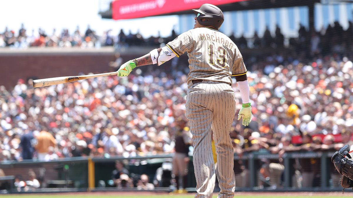 San Diego Padres third baseman Manny Machado (13) follows the ball on a two-run home run against the San Francisco Giants during the third inning at Oracle Park.