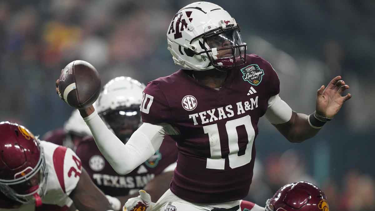 Texas A&M Aggies quarterback Marcel Reed (10) throws the ball against Southern California Trojans cornerback John Humphrey (19) in the first half at Allegiant Stadium.