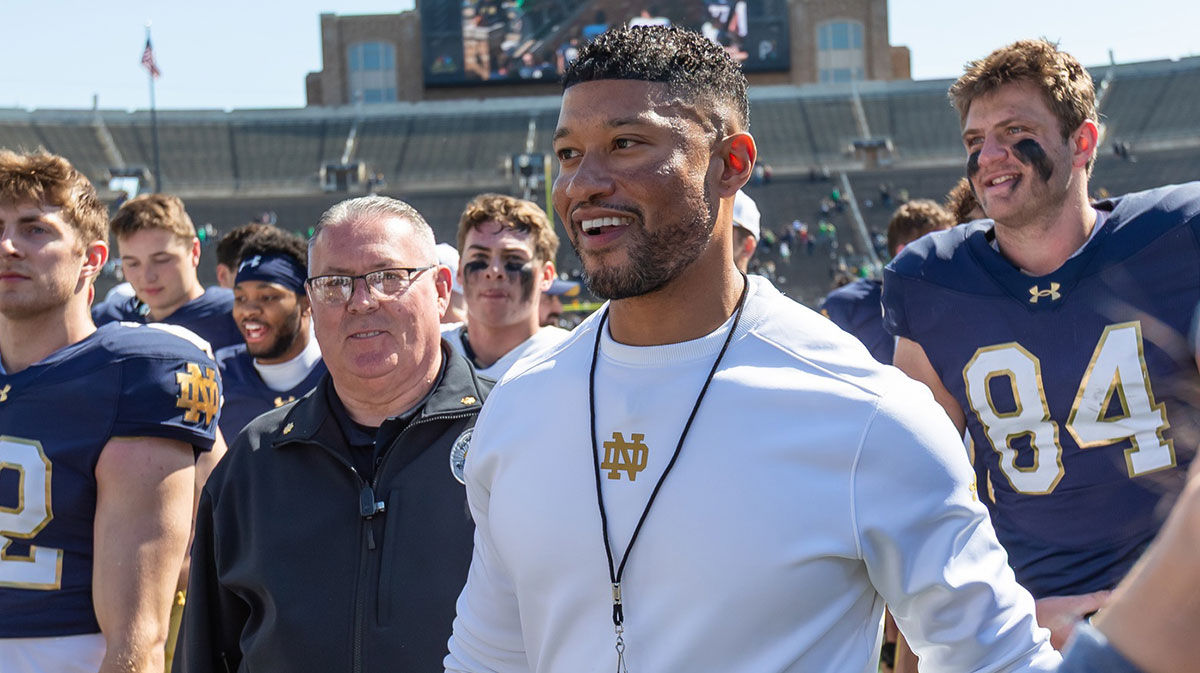 Notre Dame Fighting Irish head coach Marcus Freeman smiles as he walks off the field after the Blue-Gold game at Notre Dame Stadium.