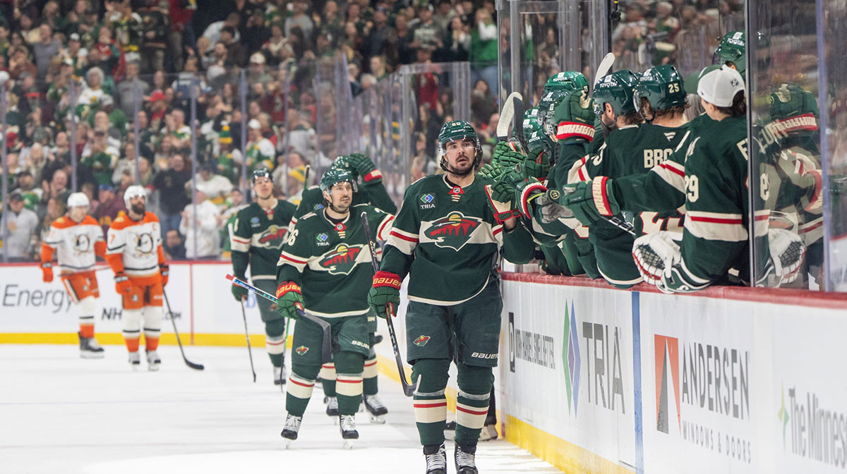 Minnesota Wild left wing Marcus Johansson (90) leads the team to the bench after scoring against the Anaheim Ducks in the first period at Xcel Energy Center.