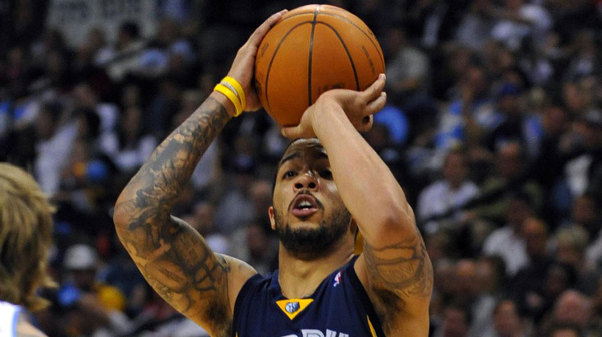 Memphis Grizzlies guard Marcus Williams (5) takes a shot on the net in the fourth quarter against the Denver Nuggets at the Pepsi Center. The Nuggets defeated the Grizzlies 123-101.
