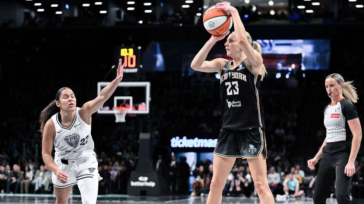 New York Liberty guard Marine Johannes (23) shoots the ball while being defended by Golden State Valkyries guard Veronica Burton (22) during the second half at Barclays Center.