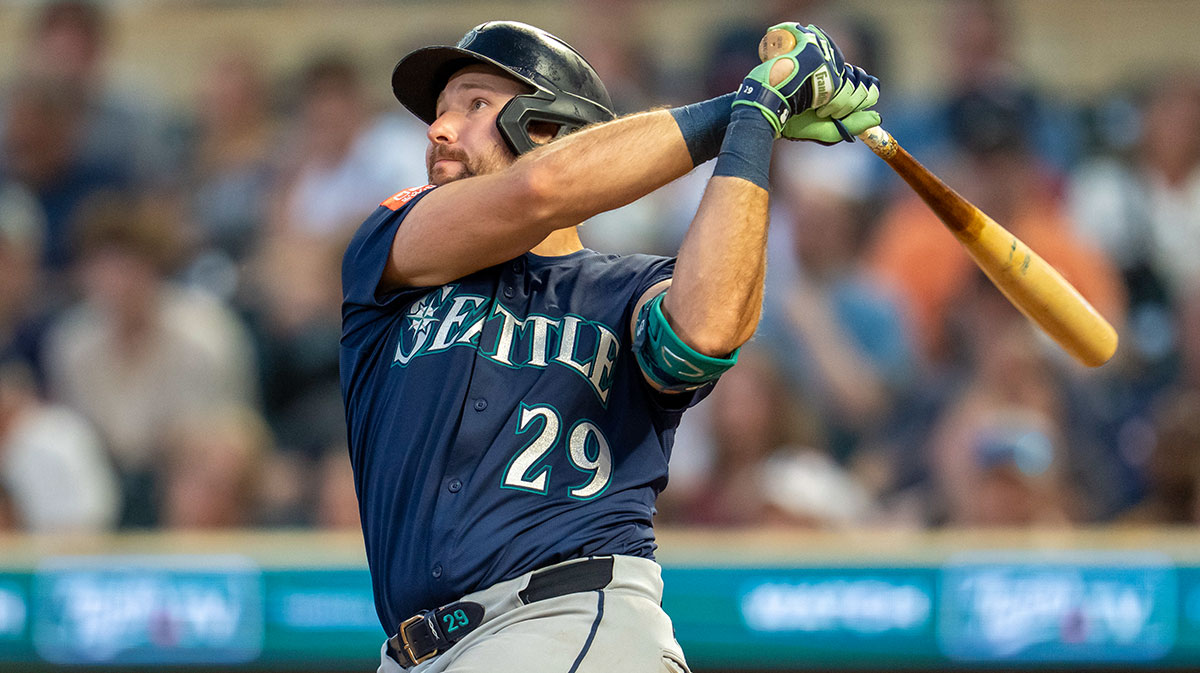 Seattle Mariners catcher Cal Raleigh (29) hits a two run home run against the Minnesota Twins in the ninth inning at Target Field.
