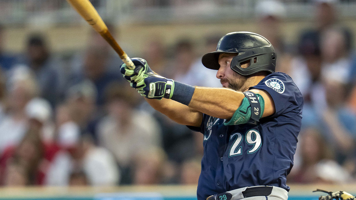 Seattle Mariners catcher Cal Raleigh (29) hits a two run home run against the Minnesota Twins in the ninth inning at Target Field.