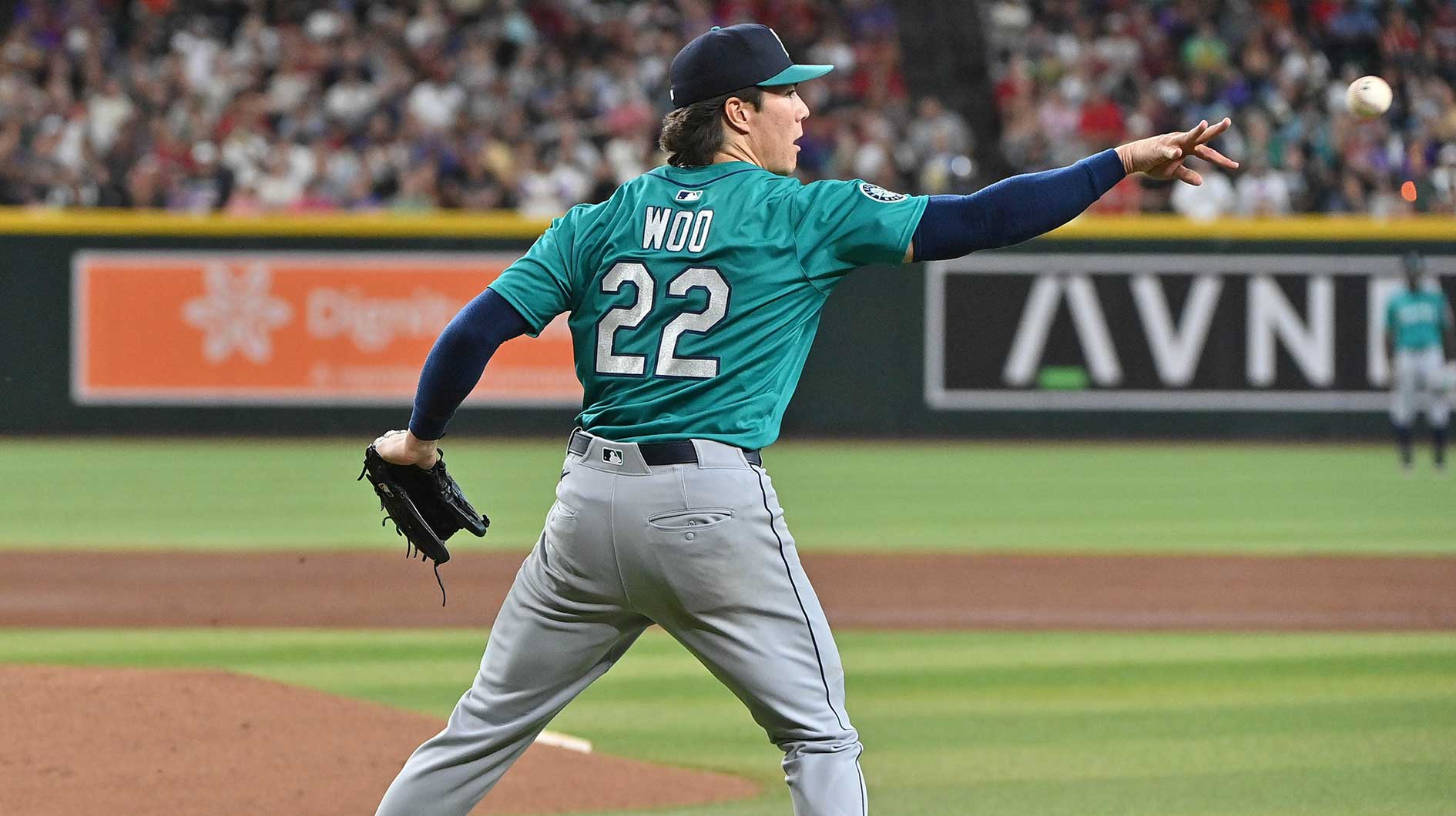 Seattle Mariners pitcher Bryan Woo (22) throws to first base in the third inning against the Arizona Diamondbacks at Chase Field.