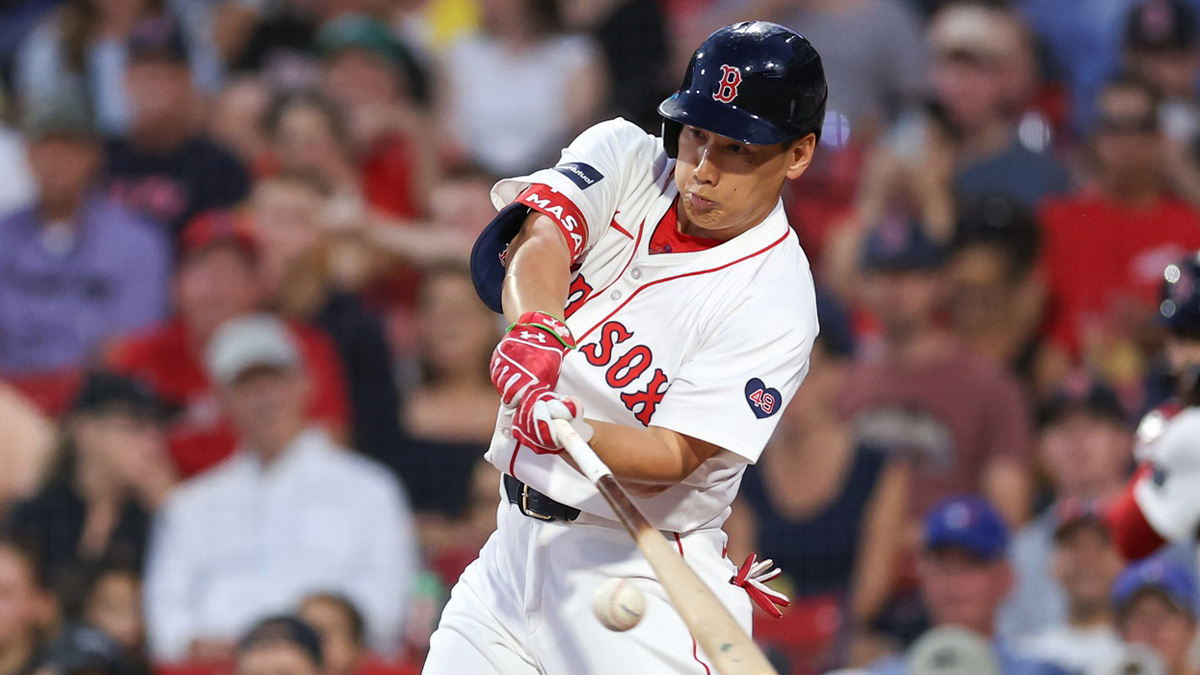 Aug 28, 2024; Boston, Massachusetts, USA; Boston Red Sox designated hitter Masataka Yoshida (7) hits a single during the first inning against the Kansas City Royals at Fenway Park.